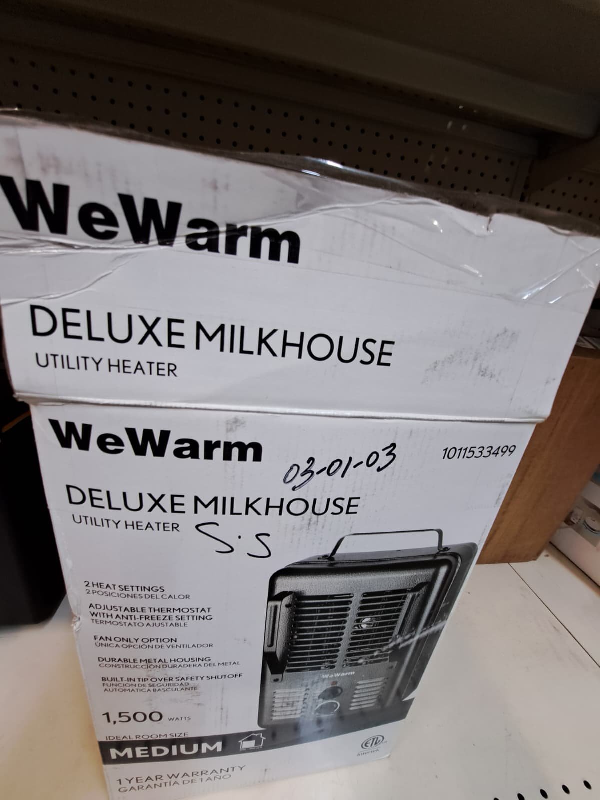 WeWarm branded black milkhouse utility heater, model HT1912, featuring a 1,500-watt capacity